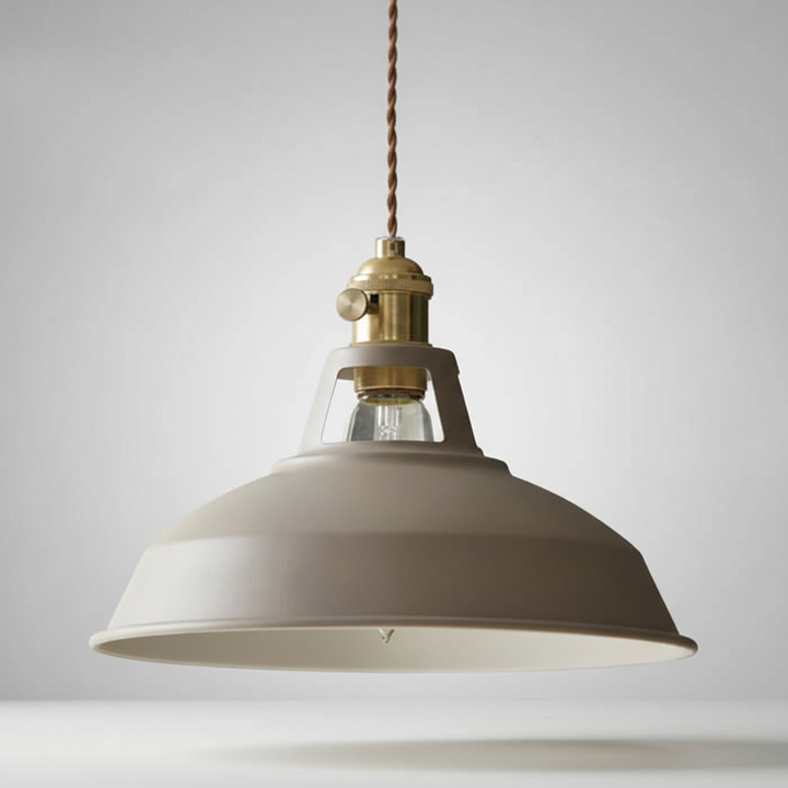 Stylish industrial metal hanging light, perfect for illuminating kitchen island workspaces.
