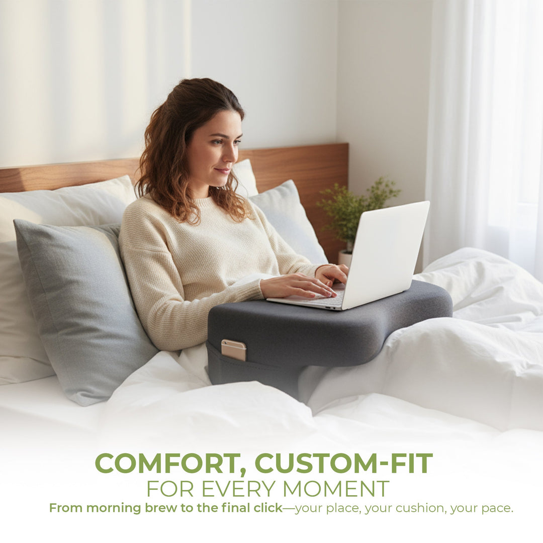 Portable reading & work pillow with integrated lap desk; ergonomic design for comfy bed or couch use.