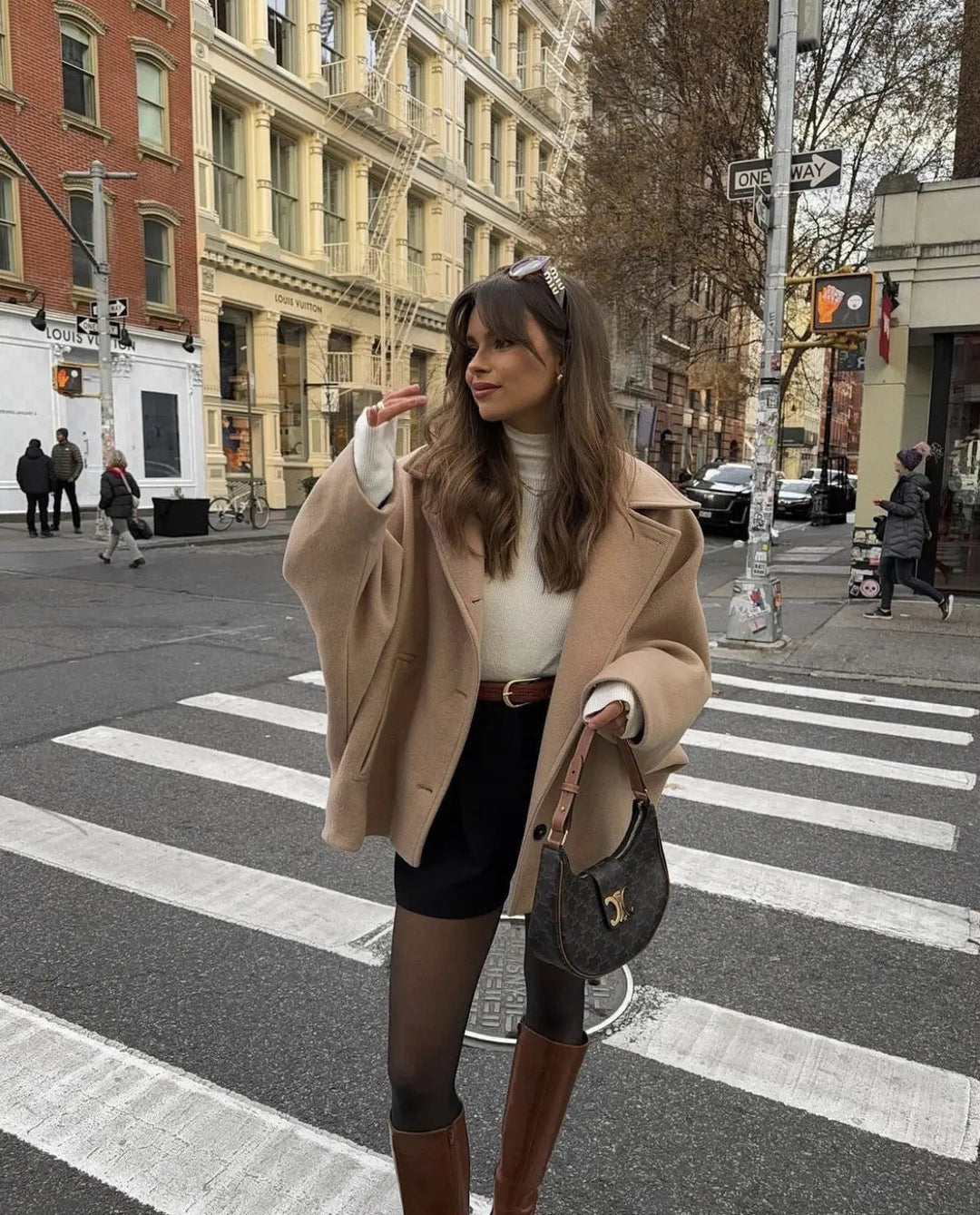 Structured yet chic women's short coat, ideal for fall/winter sophisticated layering & style.