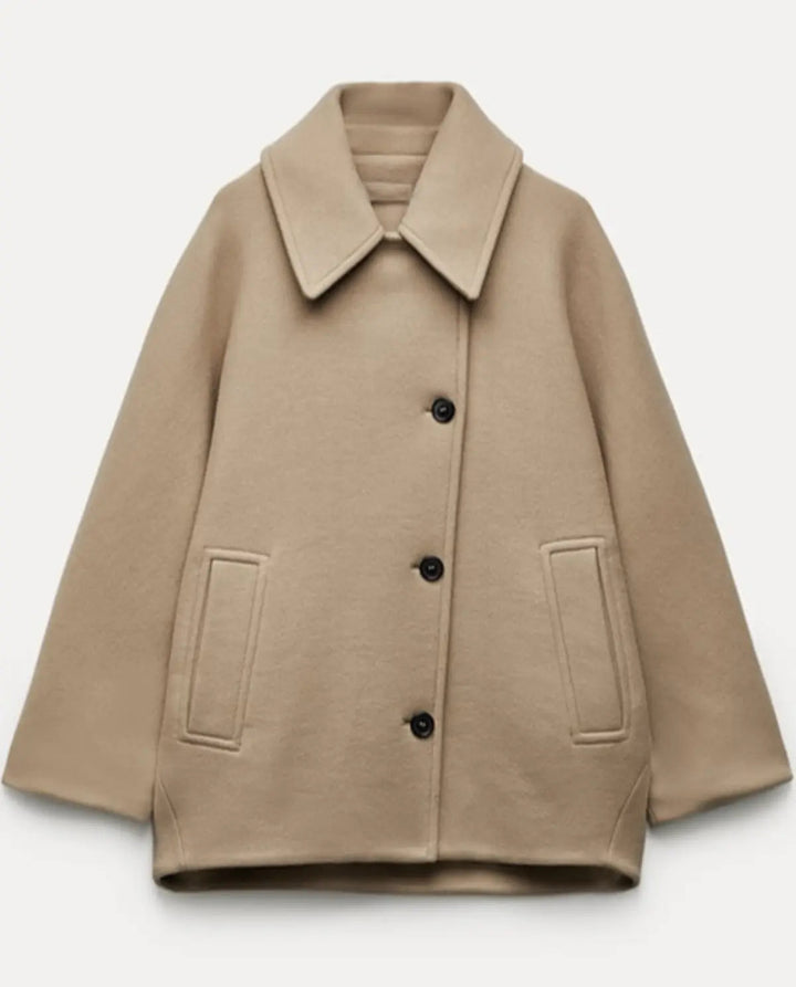 Modern women's short coat jacket, oversized fit for effortless fall/winter fashion & comfort.