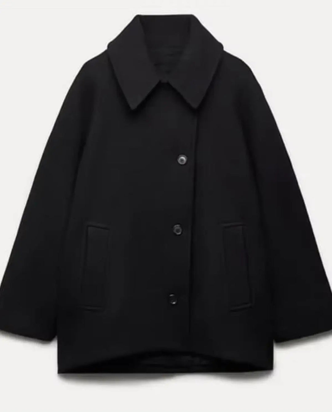 Effortless elegant women's short coat jacket, a chic addition to fall/winter fashion.