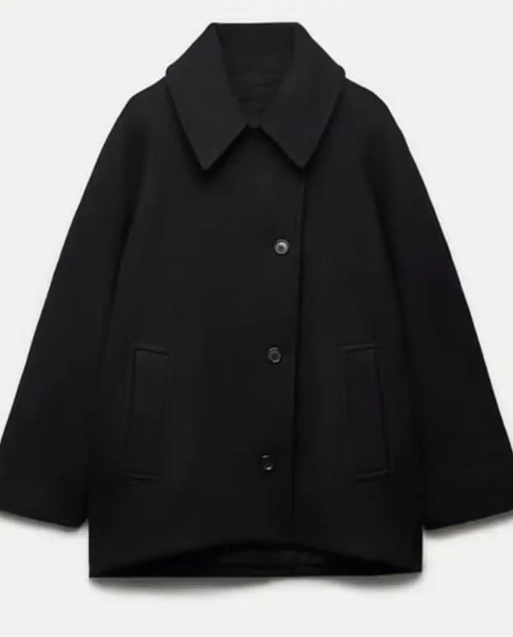 Effortless elegant women's short coat jacket, a chic addition to fall/winter fashion.