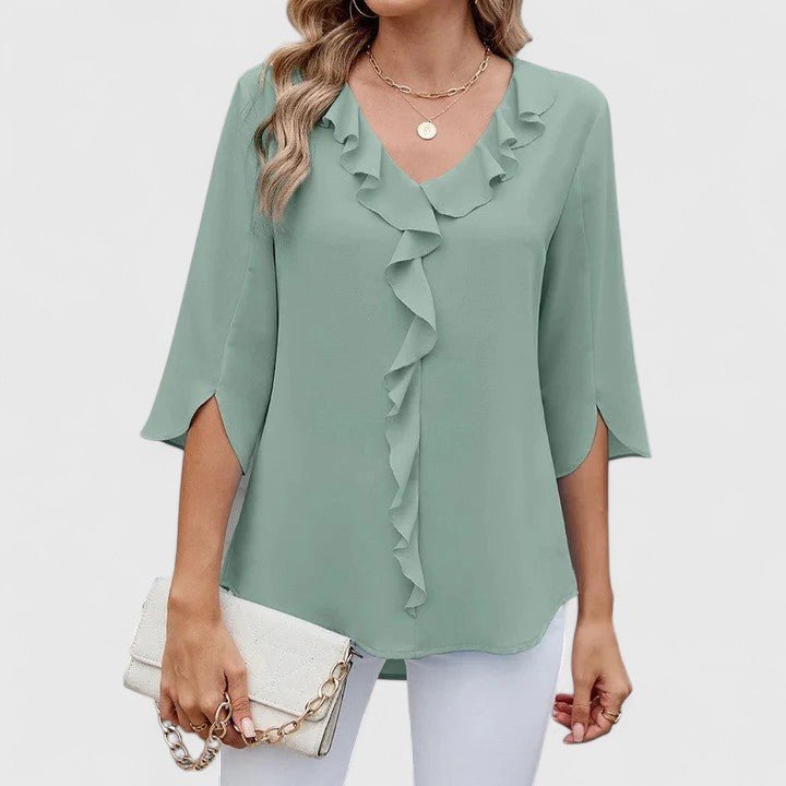 Elegant women's ruffle V-neck half-sleeve blouse, perfect for versatile fashion.
