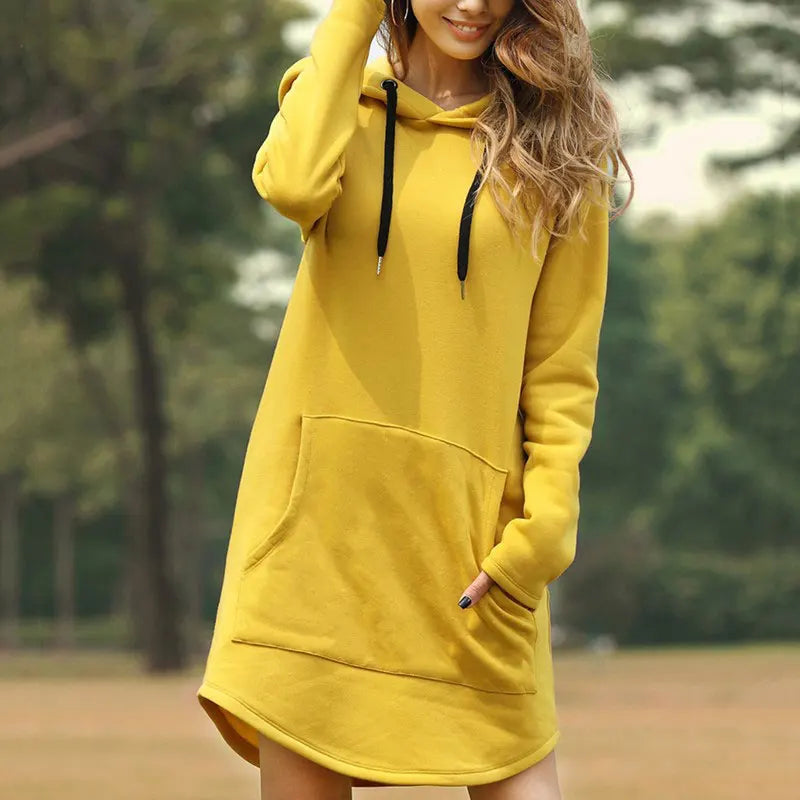 Relaxed fit women's long sleeve hoodie dress, super cozy with practical front pockets.