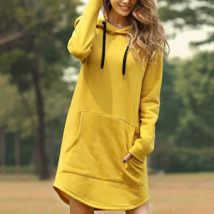 Relaxed fit women's long sleeve hoodie dress, super cozy with practical front pockets.