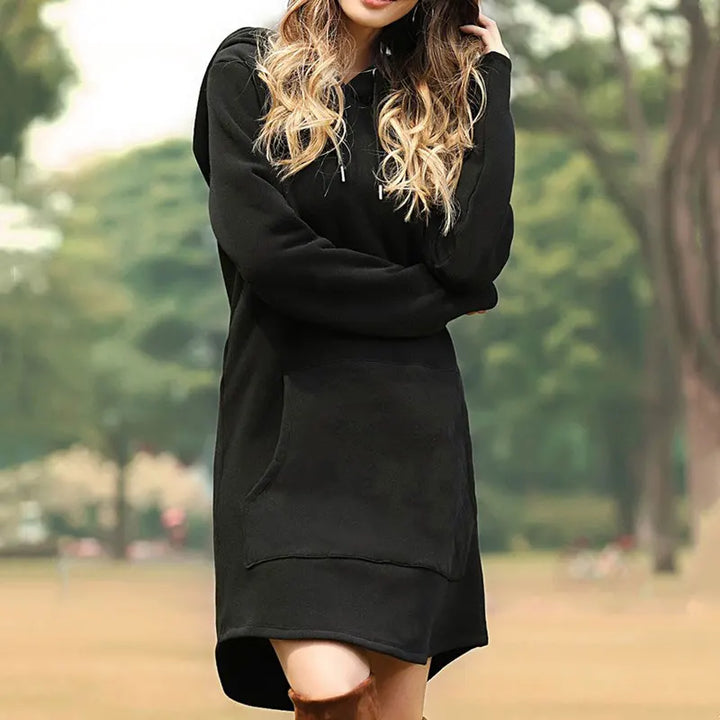 Oversized women's cozy hoodie dress, long sleeves, convenient pockets, ultimate loungewear.