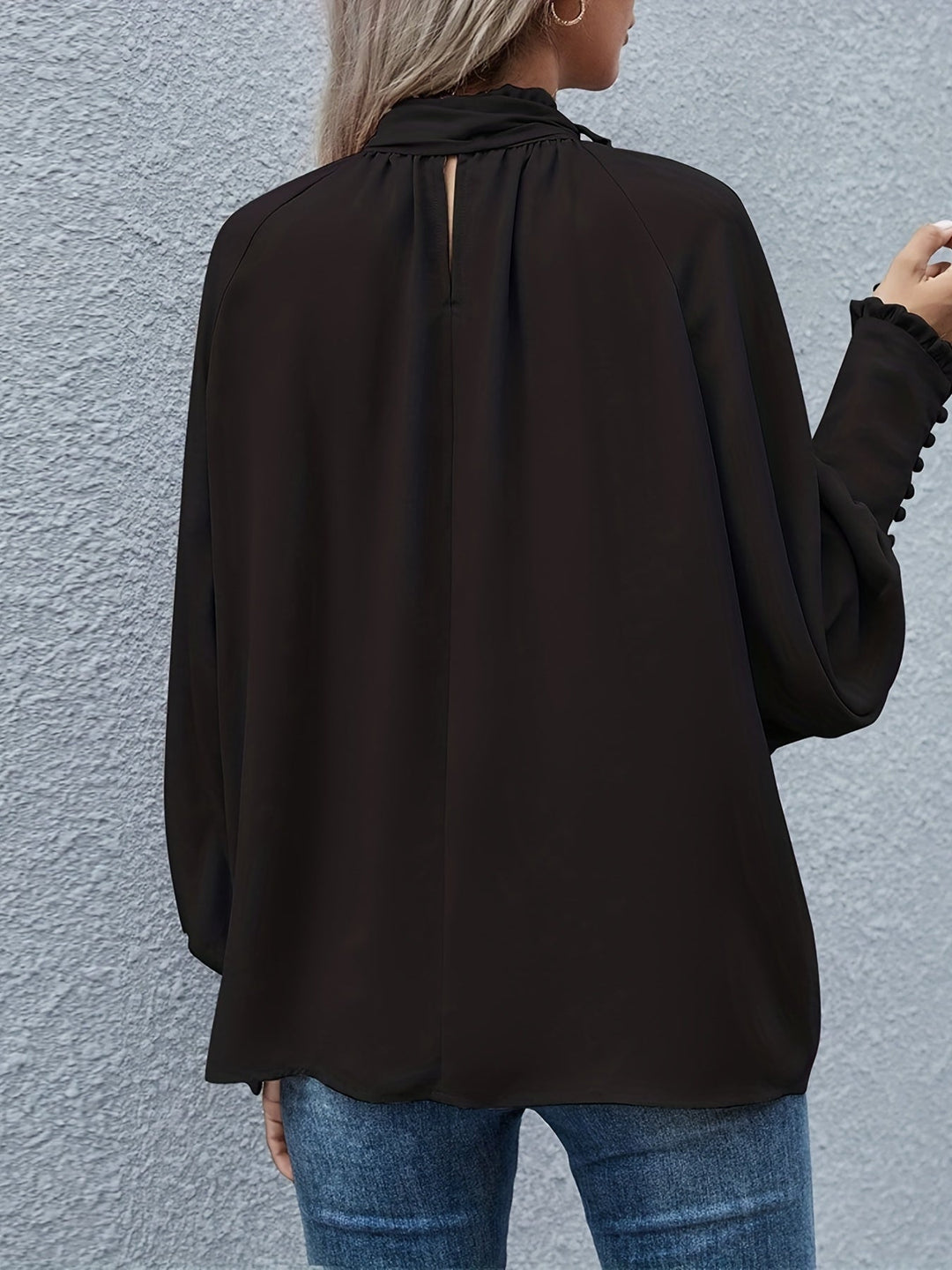 Elegant long sleeve tie-neck blouse for women, a perfect sophisticated workwear top. Fashionable & comfortable.