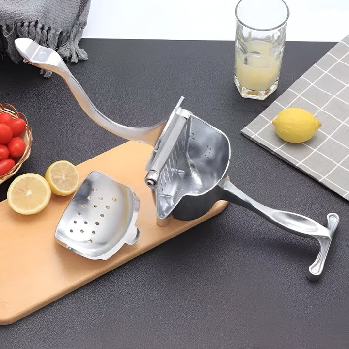 Compact manual citrus press, an effective lemon & lime squeezer for fresh juice. Easy clean kitchen tool.