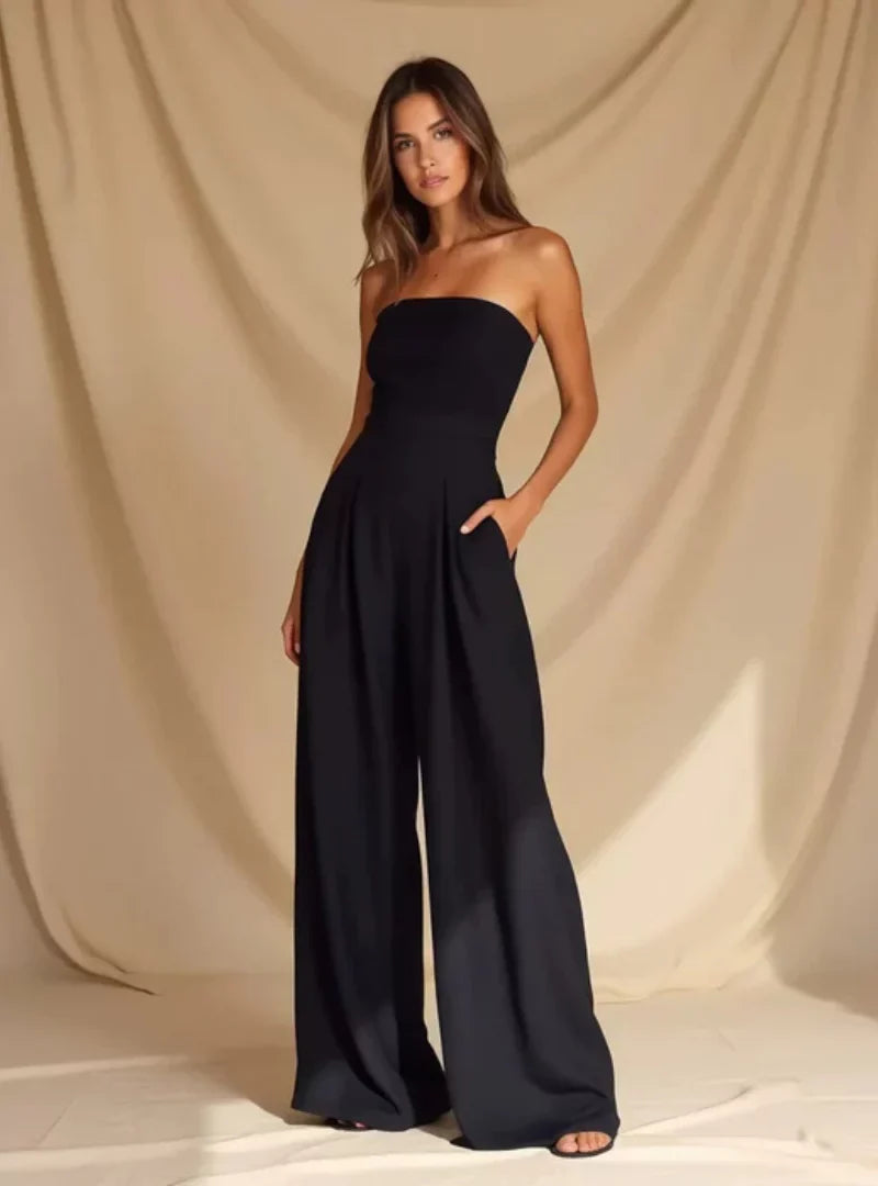 Elegant women's strapless wide leg jumpsuit, perfect for evening wear or chic summer events. A versatile one-piece.