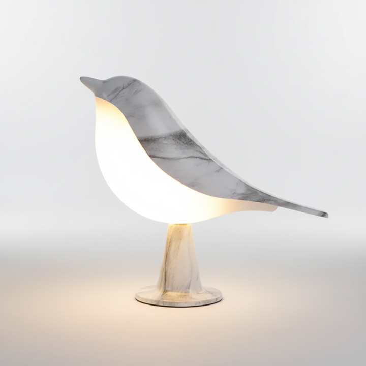 Close-up of FeatherLuxe wireless LED table lamp, showcasing elegant design & touch control surface.