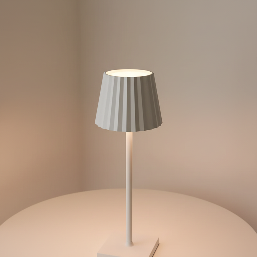 Portable wireless LED table lamp, battery-powered for indoor accents or outdoor lighting. Easy touch control.