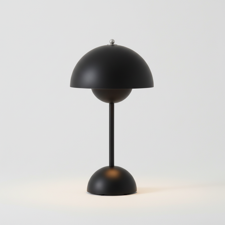 Unisex LED table lamp, RadiantOrb, showcasing its sleek design and providing portable ambient lighting.