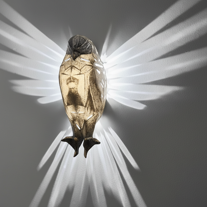 Decorative wireless wall light with beautiful owl silhouette. Battery operated resin art lamp for cozy room ambiance.