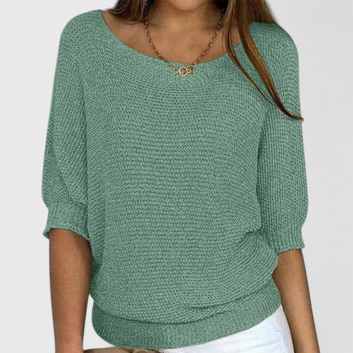 Women's cozy knit long sleeve sweater in soft fabric, perfect for everyday comfort & chic versatile styling.