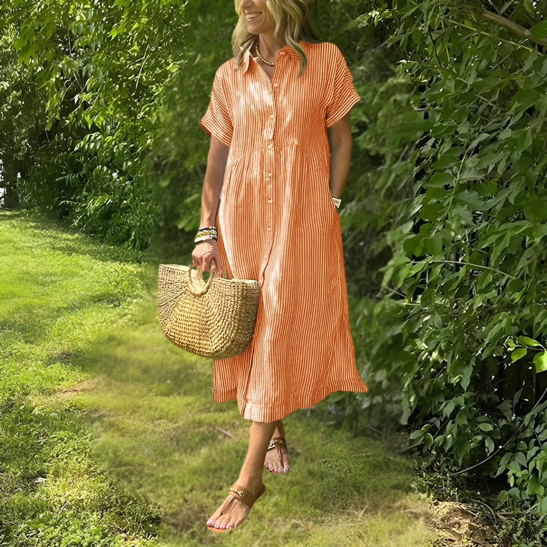 Effortless women's midi dress with flattering vertical stripes, a comfortable long sleeve option for winter.