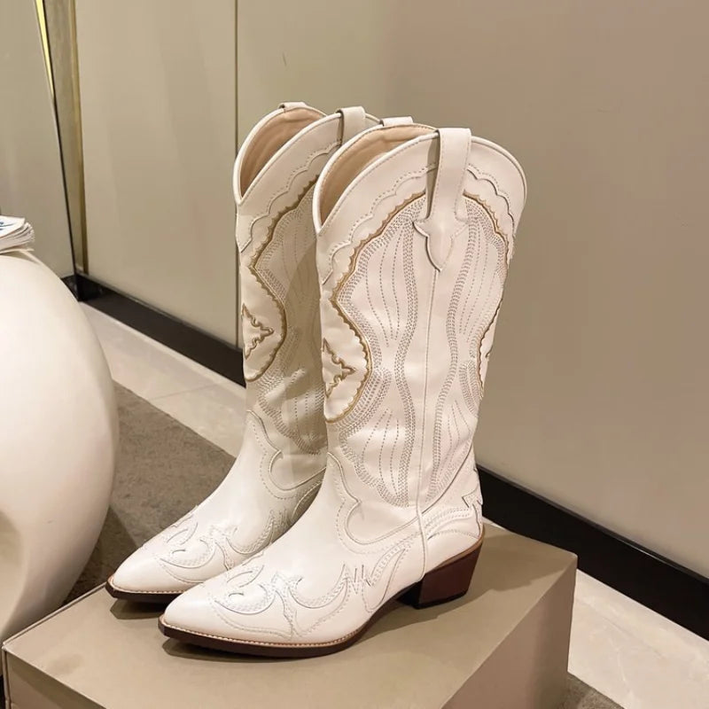Women's embroidered waterproof western cowboy boots, perfect for fall and winter style.