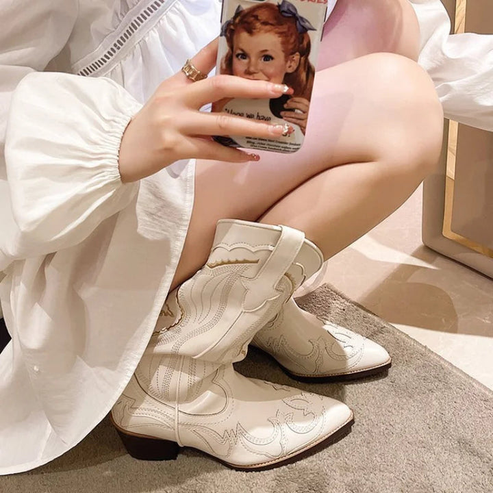 Fashionable women's embroidered western boots, offering waterproof protection and a stylish look.