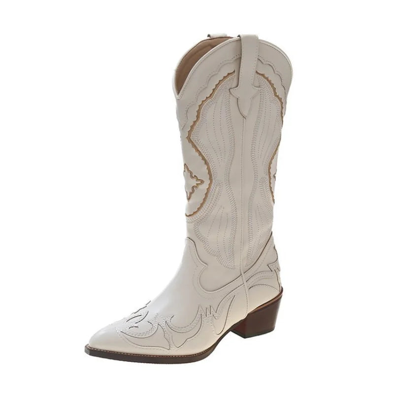 Versatile women's waterproof cowboy boots with intricate embroidery, suitable for various outfits.