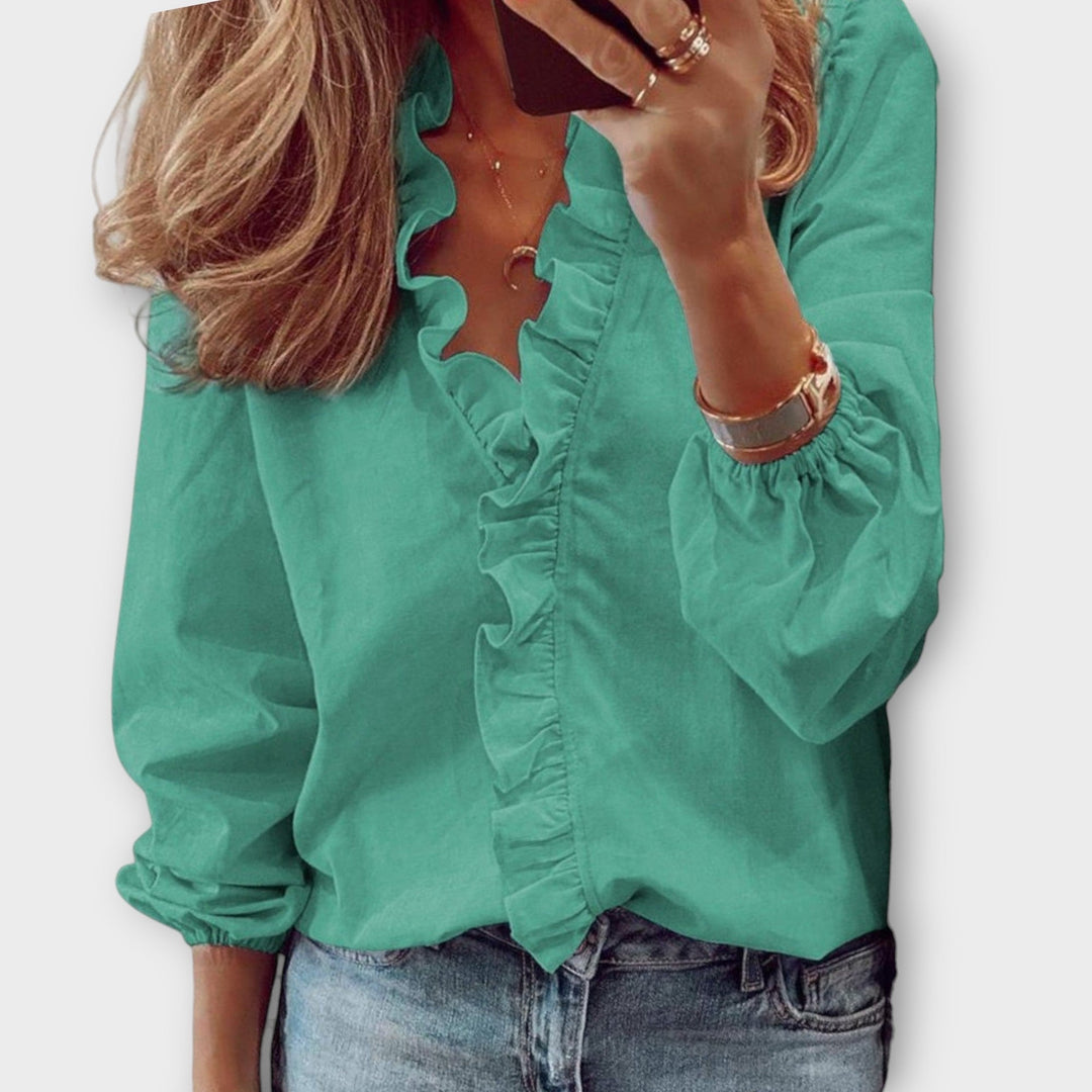 Mint Flora Ruffle V-Neck Long Sleeve Blouse. Chic women's top for versatile fashion, great for spring & fall.