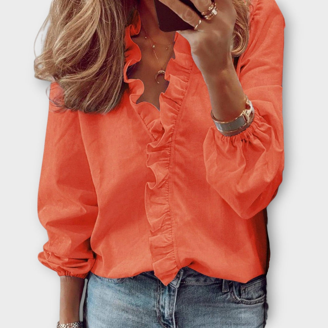 Orange Women's Flora Ruffle V-Neck Long Sleeve Blouse, a casual yet elegant top for various occasions.