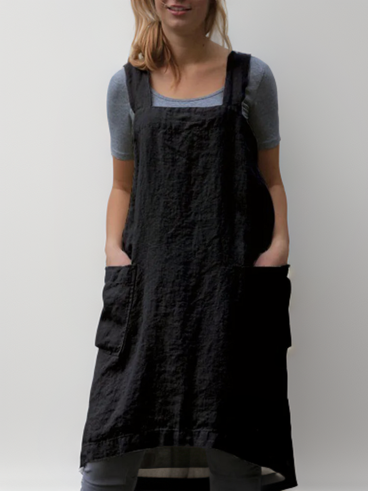 Chic women's apron midi dress, blending elegance with casual comfort and fashion.