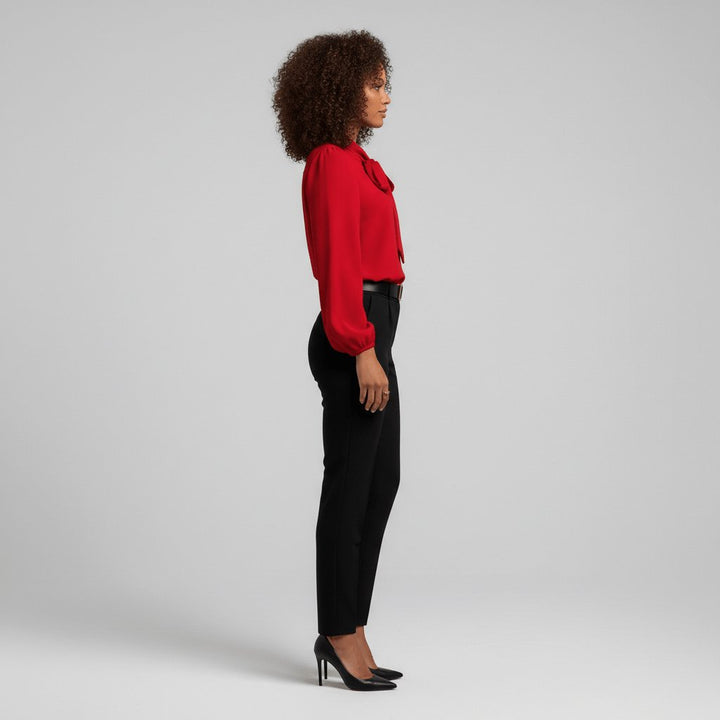 Versatile women's elegant long-sleeve blouse featuring a sophisticated bow-tie. Ideal for office wear.