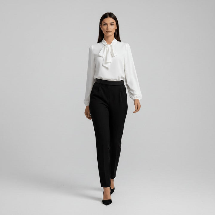 Comfortable elegant women's long-sleeve blouse with a chic bow-tie. Versatile for any fashion occasion.