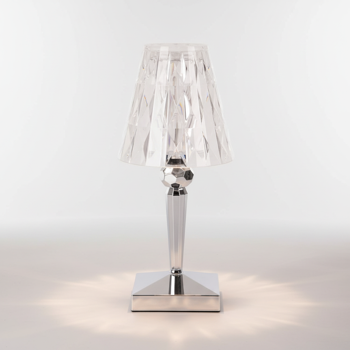 Decorative crystal table lamp, Prismara, casting beautiful light for living room & bedroom ambiance.