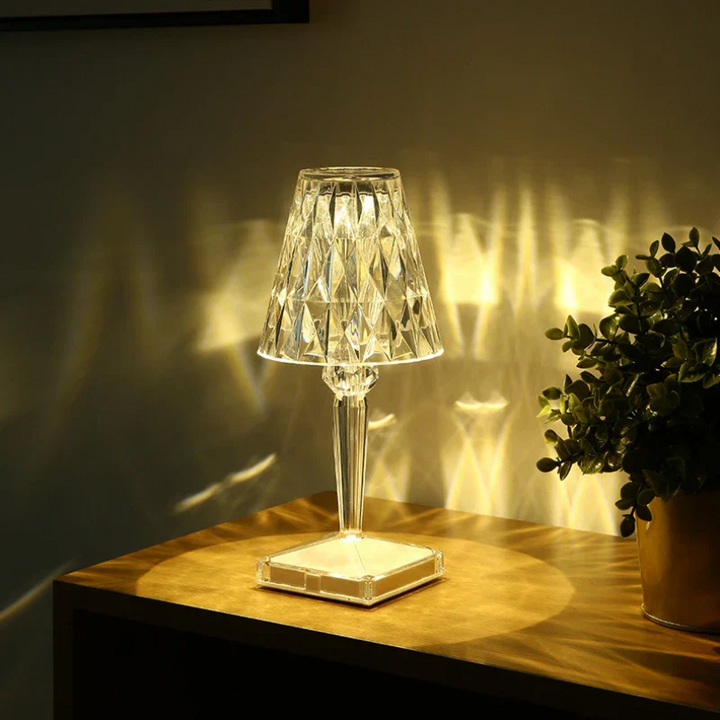 Luxury Prismara crystal table lamp. Stunning decorative piece for ambient bedroom or living room lighting.