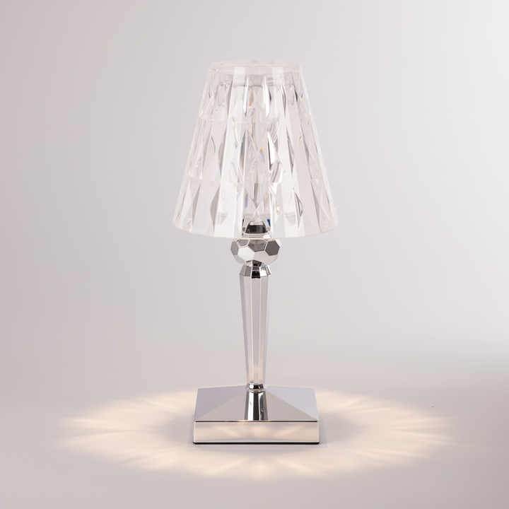 Artistic crystal optics table lamp, Prismara, a decorative highlight for any contemporary home decor.