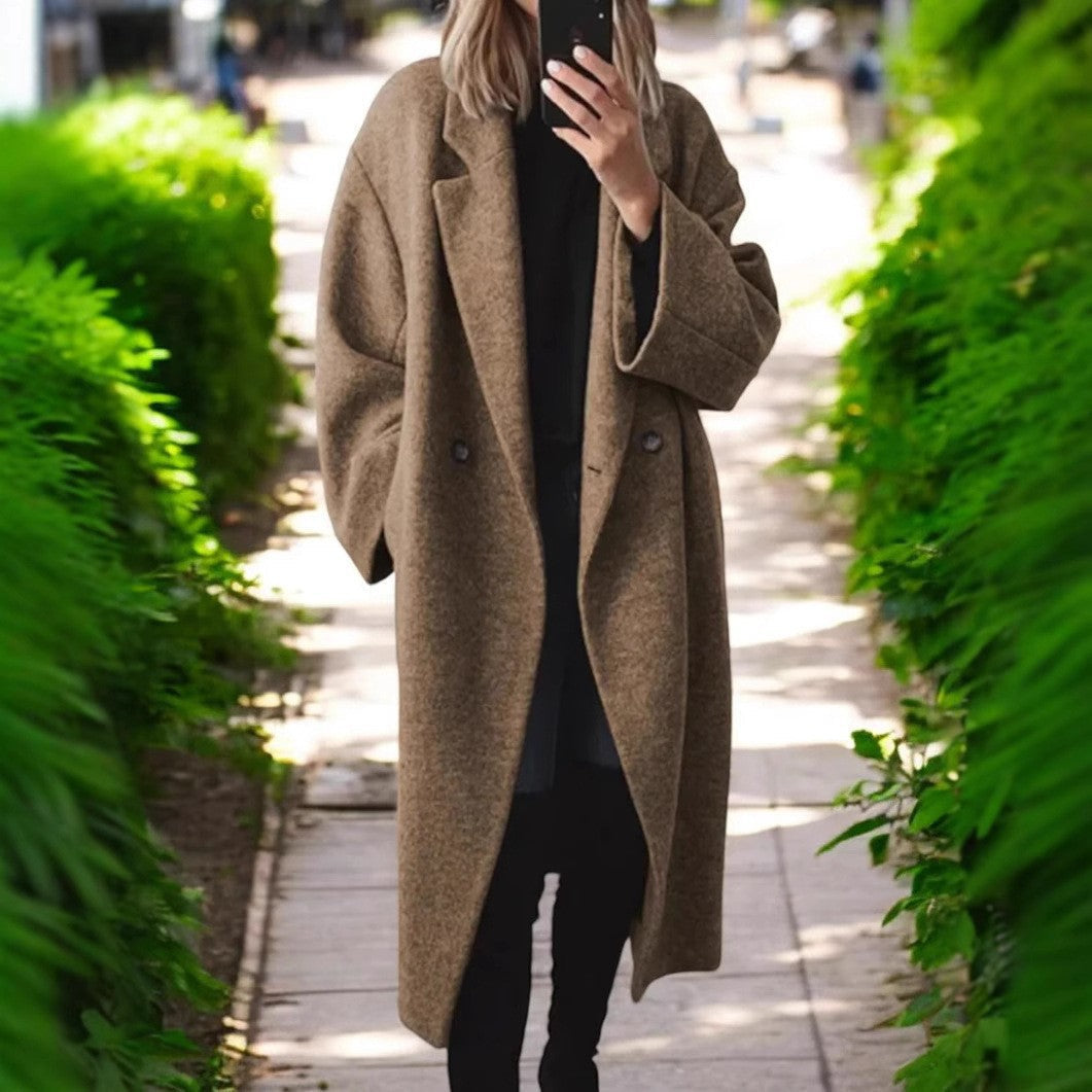 Women's oversized wool winter coat in a chic, elegant style for modern fall fashion.