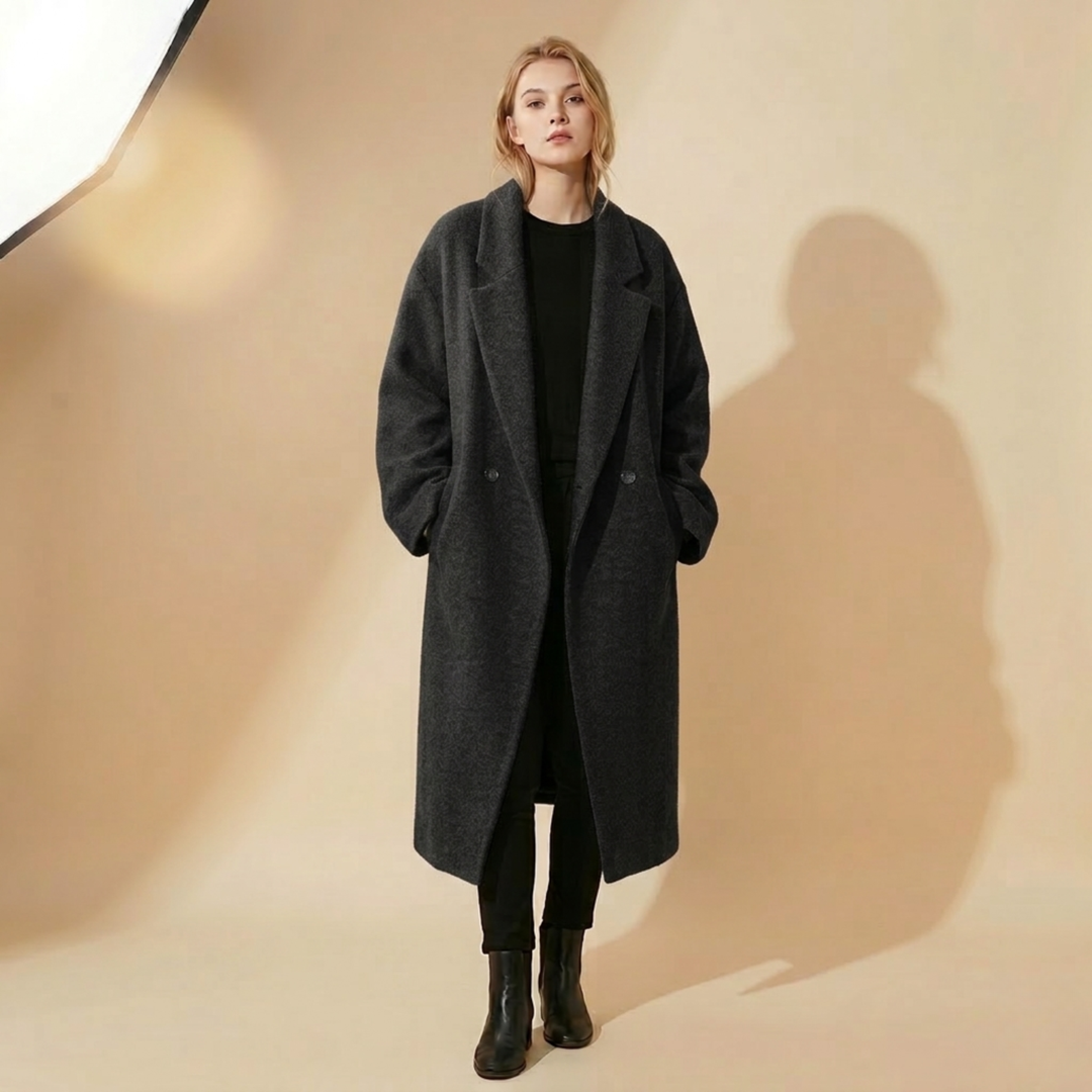 Modern women's wool oversized winter coat, providing chic warmth and a relaxed, elegant silhouette for fall.
