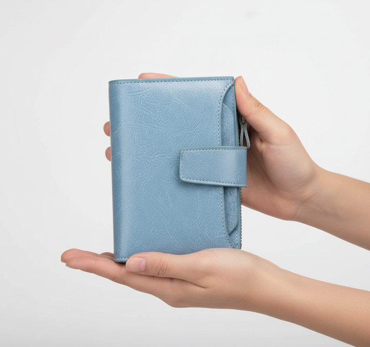 Elegant women's small leather wallet, RFID-blocking feature, holds cards & notes.
