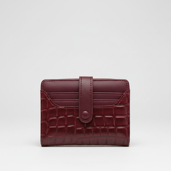 Snap closure luxury women's compact wallet, a trendy fashion purse with ample card storage.