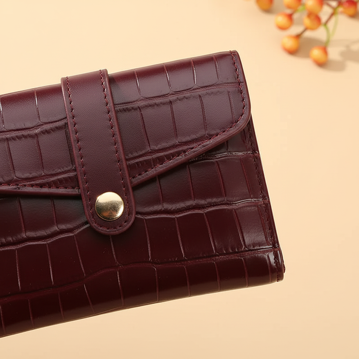 Fashionable women's compact wallet with elegant sequin detail, a luxury accessory for cards.