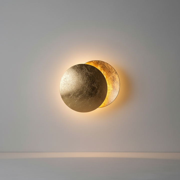 Contemporary EclipseHalo LED wall lamp, perfect for home decor. Artistic, warm light, and metallic finish.