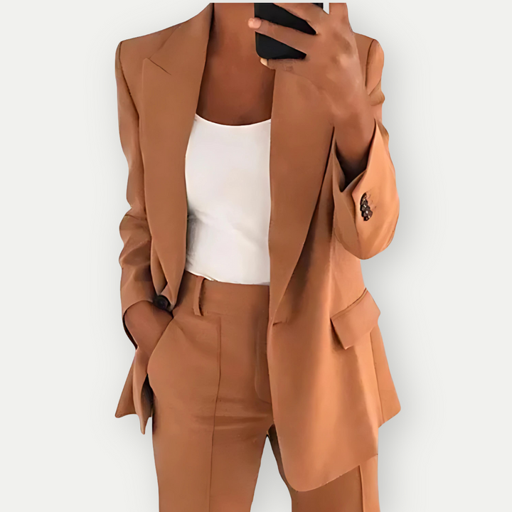 Versatile women's elegant suit set with a sharp blazer and well-fitting trousers for chic office fashion.
