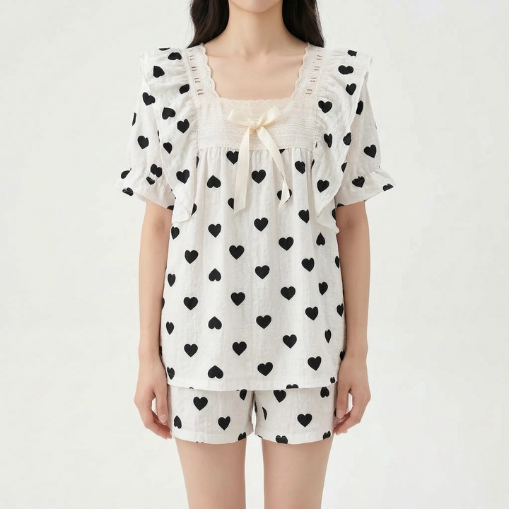 Cozy women's short sleeve pyjama set with beautiful lace trim, great for sleep and relaxation.