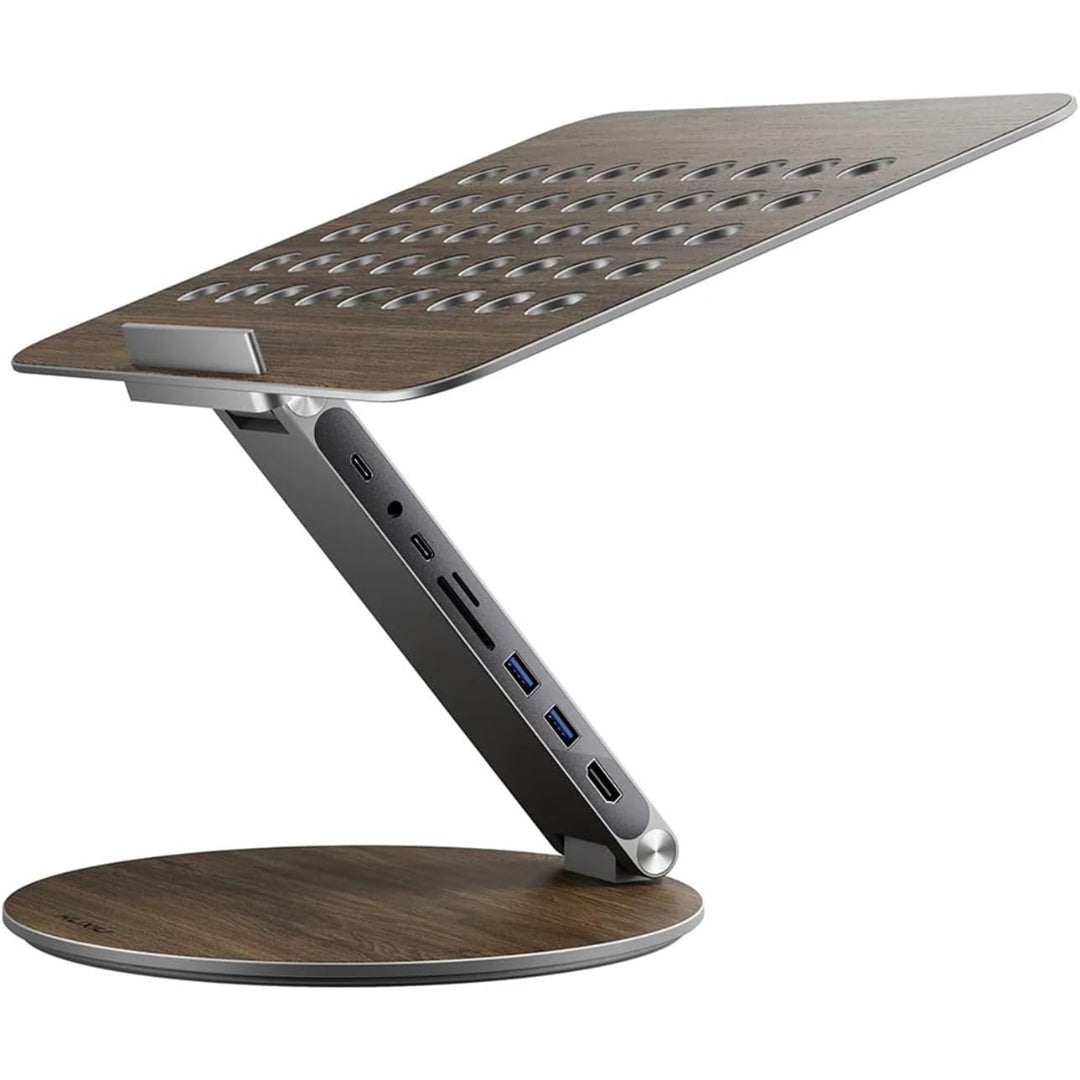 Universal adjustable laptop stand with integrated USB C docking, rotating base; perfect for an ergonomic tech workspace.