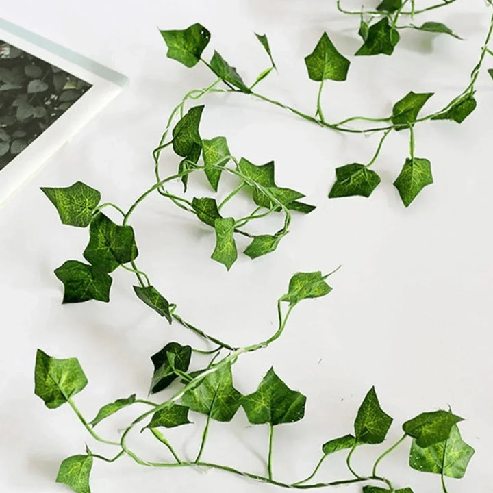 Warm white LED leaf vine lights, providing a gentle, inviting glow for year-round decoration.