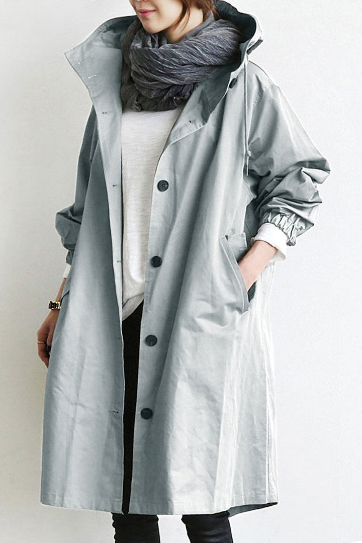 Women's elegant waterproof trench coat with hood, classic style for all-weather fall & spring fashion.