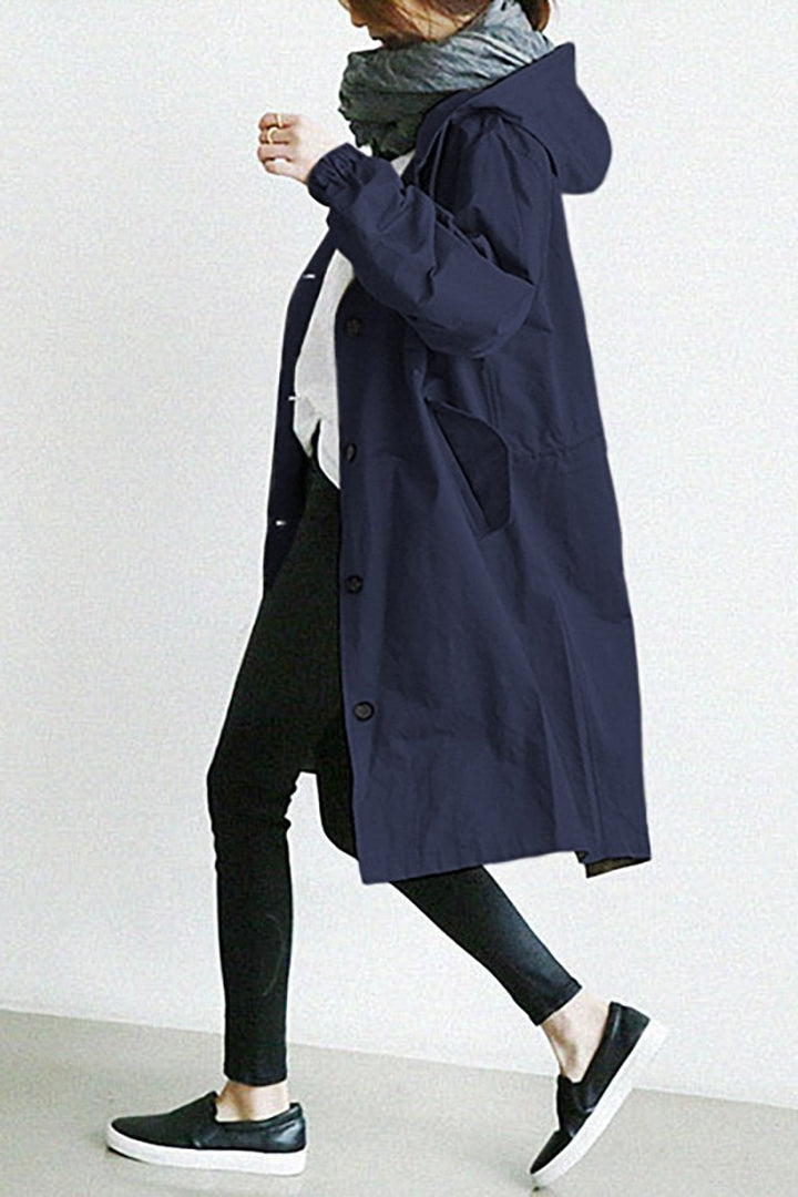 Women's classic elegant trench coat, waterproof with hood & belt, stylish outerwear for rain & fashion.