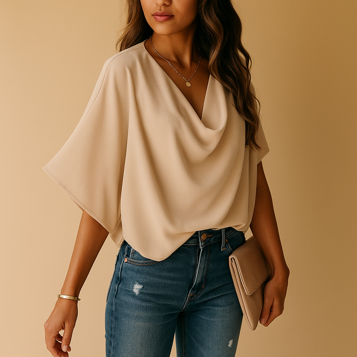 Sophisticated women's batwing sleeve blouse, a chic and comfortable fashion statement.