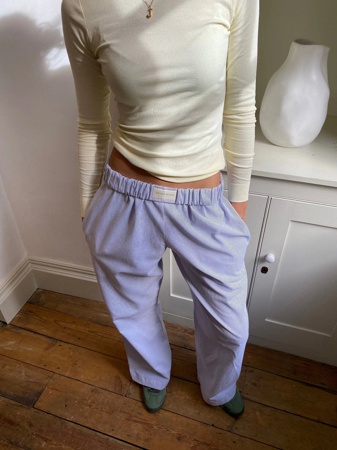 Ultra-comfortable women's relaxed fit lounge pants with soft fabric & elastic waist for easy wear.