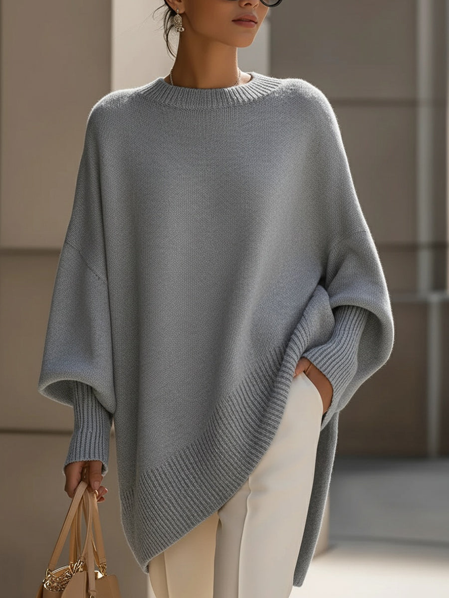 Relaxed fit women's drape sweater with an oversized silhouette. Modern comfort & style.