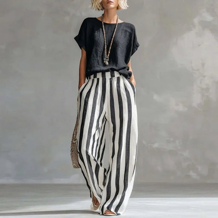 Comfortable & elegant women's linen blend two-piece set. Relaxed fit top & wide-leg pants for summer style.
