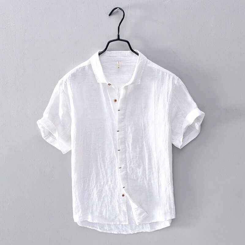 Comfortable men's modern fit short sleeve button-up shirt. Breathable & stylish for summer casual wear.