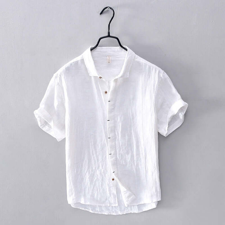 Comfortable men's modern fit short sleeve button-up shirt. Breathable & stylish for summer casual wear.