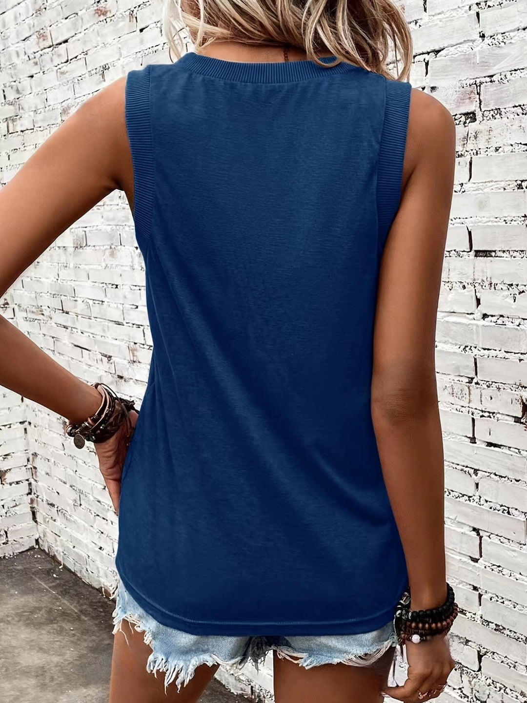 Casual wear women's tank top, featuring a sleeveless design and breathable fabric for summer.