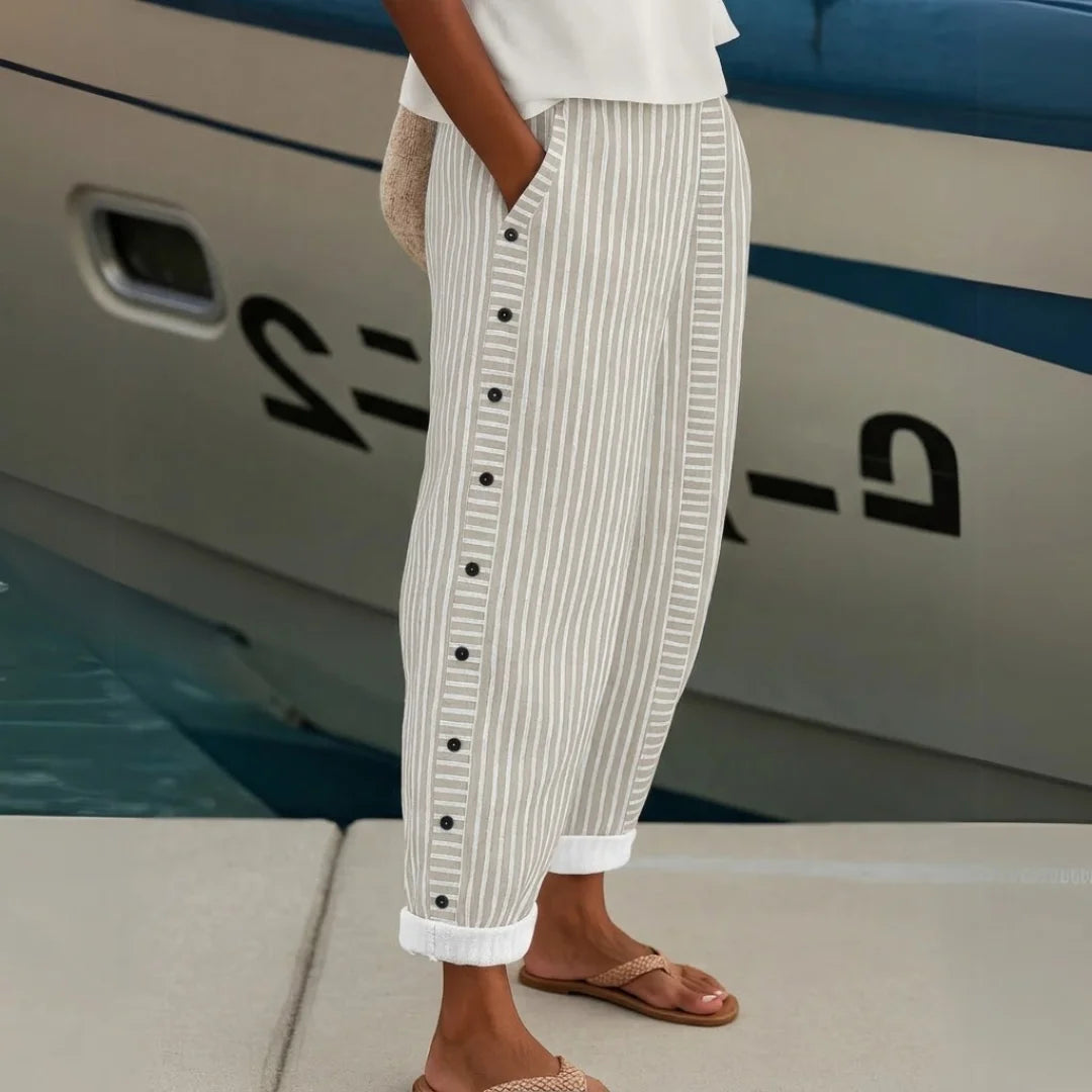 Fashionable women's wide-leg striped pants, high-waisted for an elegant silhouette & comfortable fit.